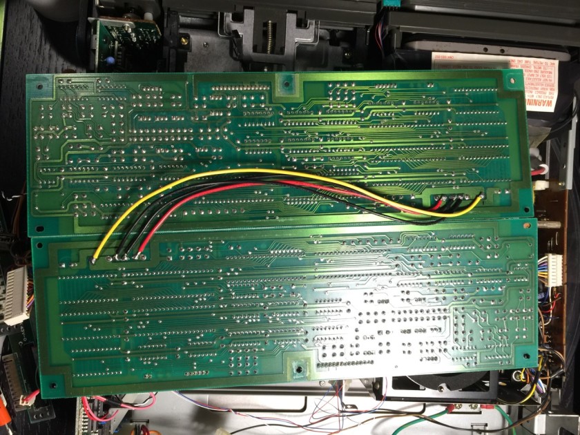 Powering two SX-64 FDD boards by jumpering the rear power pins.